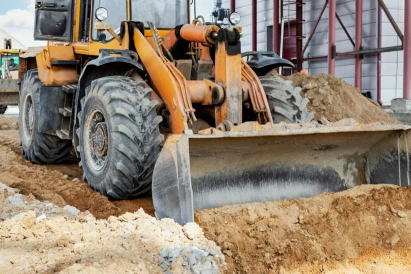 powerful front loader construction site performs sanding moving soil with construction equipment excavation 2 (2)